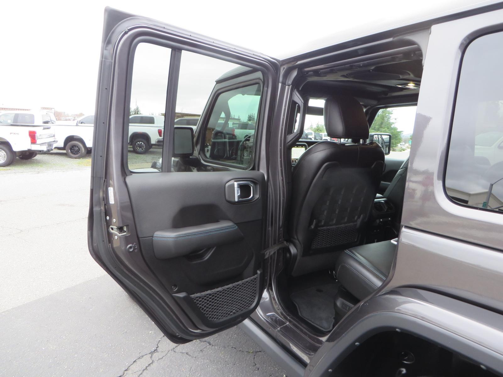 2021 CHARCOAL /BLACK Jeep Wrangler Unlimited Rubicon 4XE 4d SUV 4wd (1C4JJXR60MW) with an 2.0L L4 DOHC 16V TURBO engine, automatic transmission, located at 2630 Grass Valley Highway, Auburn, CA, 95603, (530) 508-5100, 38.937893, -121.095482 - 4XE Rubicon sitting on a Zone offroad suspension system, Fox shocks, 37" Toyo RT trail tires, 17" Method Race wheels, Teraflex Hd tire carrier, and Flat tow ready. - Photo #38